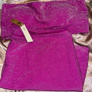 Pink shimmery bikini top and skirt by Victoria’s Secret